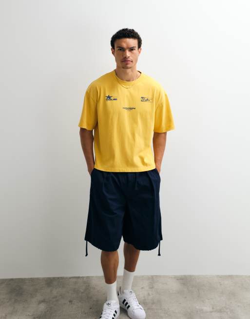 ASOS DESIGN oversized T-shirt with street graphic in yellow wash, 4 of 7