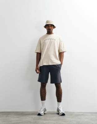 Asos Design Oversized T-shirt With Studio Graphic In Neutral
