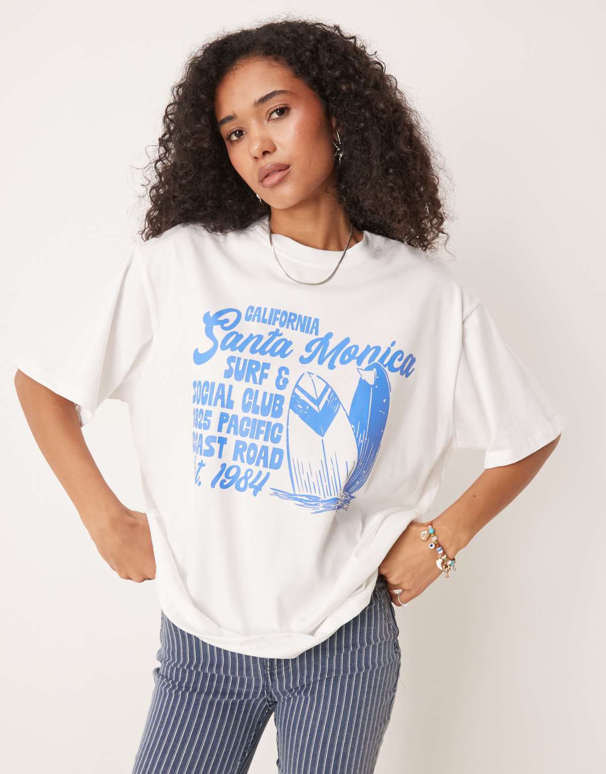 ASOS DESIGN oversized t-shirt with surf graphic in white