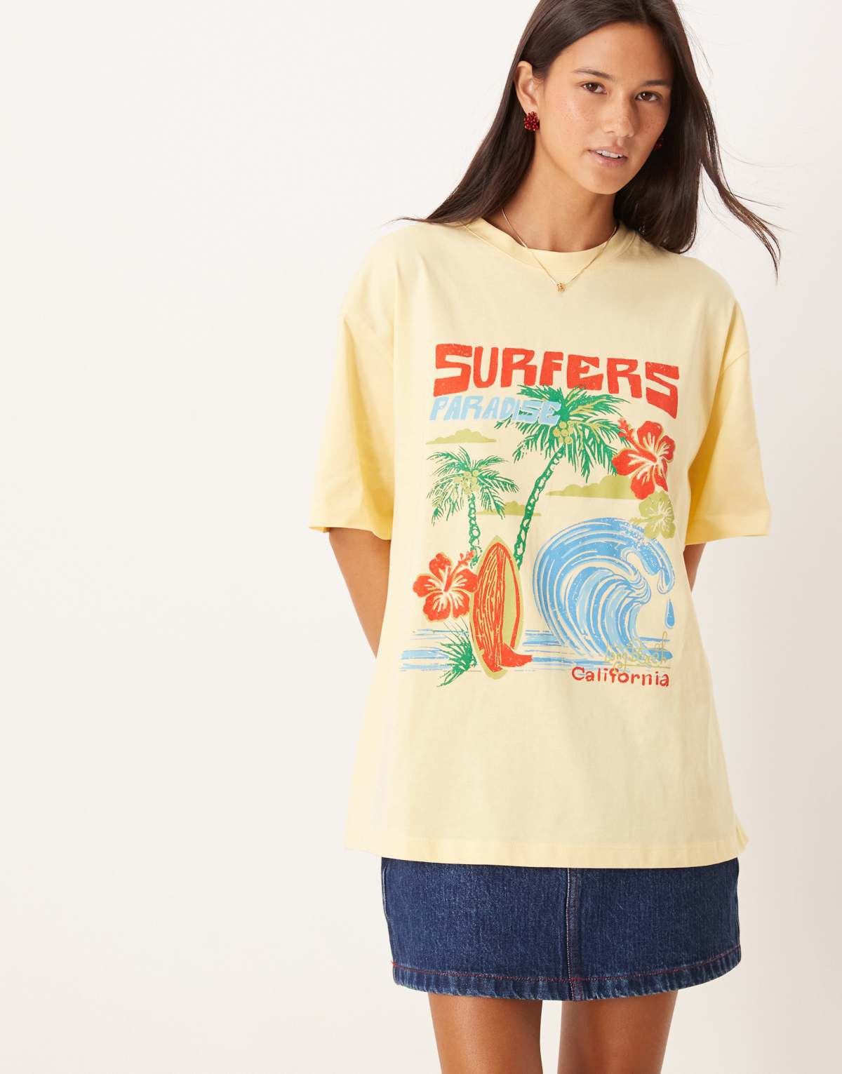 ASOS DESIGN oversized t-shirt with surfer graphic in buttermilk