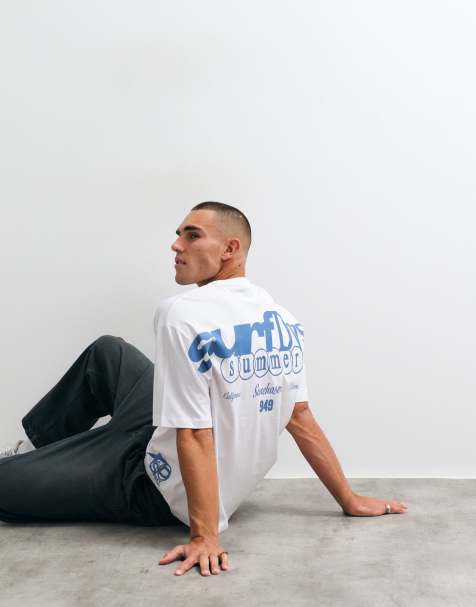 ASOS DESIGN oversized T-shirt with surfing graphic in white - view 1