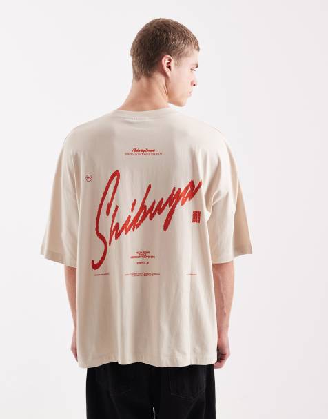 ASOS DESIGN oversized t-shirt with text graphic in beige