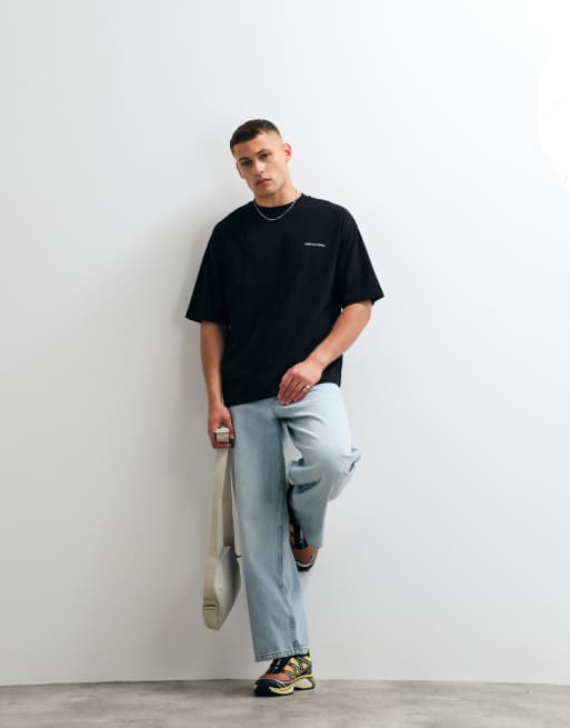 ASOS DESIGN oversized t-shirt with text graphic in black, 2 of 5