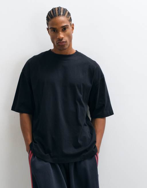 ASOS DESIGN oversized t-shirt with text graphic in black, 2 of 5