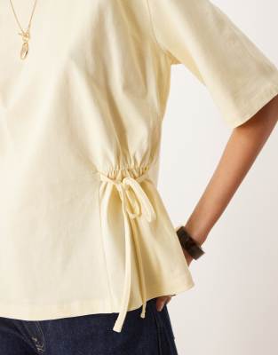 ASOS DESIGN oversized T-shirt with tie detail in lemon