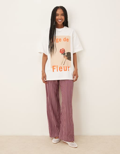ASOS DESIGN oversized T-shirt with tige de fleur graphic in