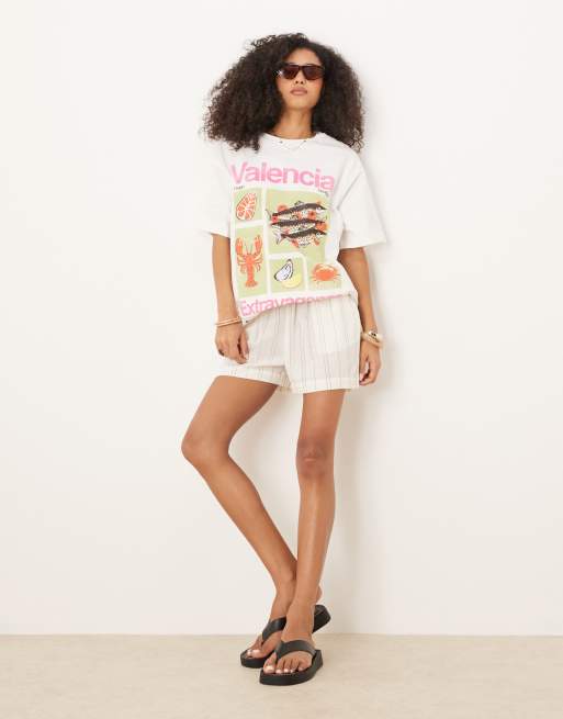 ASOS DESIGN oversized t-shirt with valencia food graphic in cream