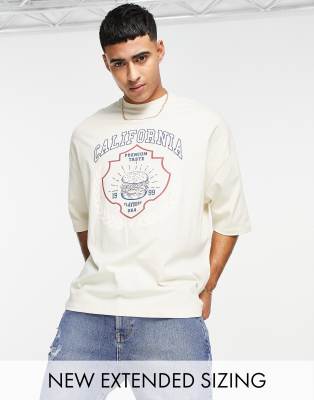 ASOS DESIGN oversized t-shirt with varsity front print in beige  - ASOS Price Checker
