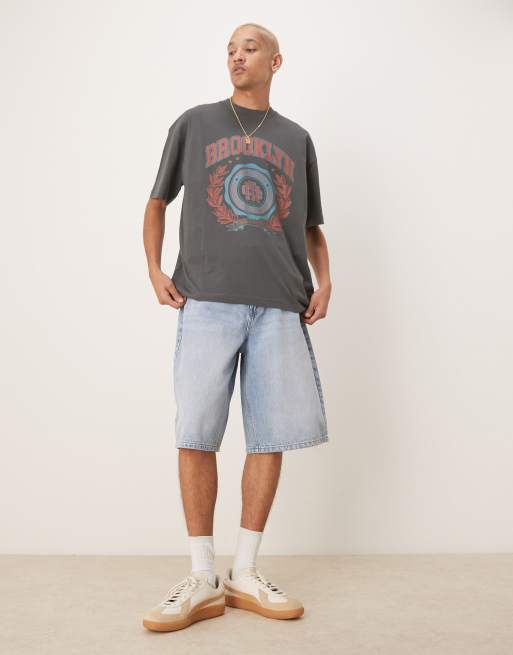 ASOS DESIGN oversized t-shirt with varsity graphic in charcoal