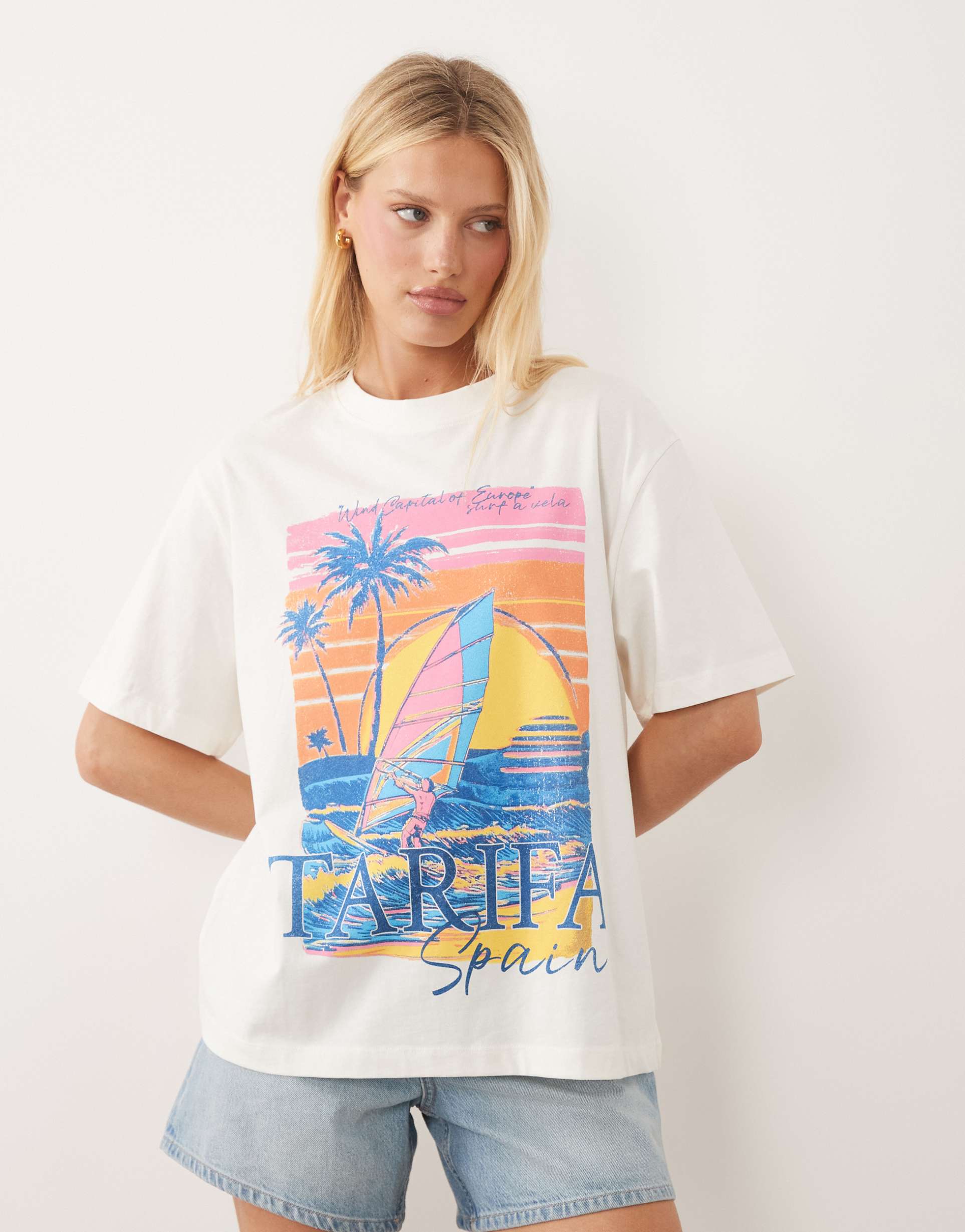 asos design oversized t-shirt with vintage tarifa vacation graphic in cream