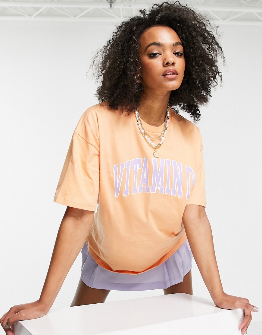 ASOS DESIGN oversized T-shirt with 'Vitamin D' graphic in washed coral-Orange