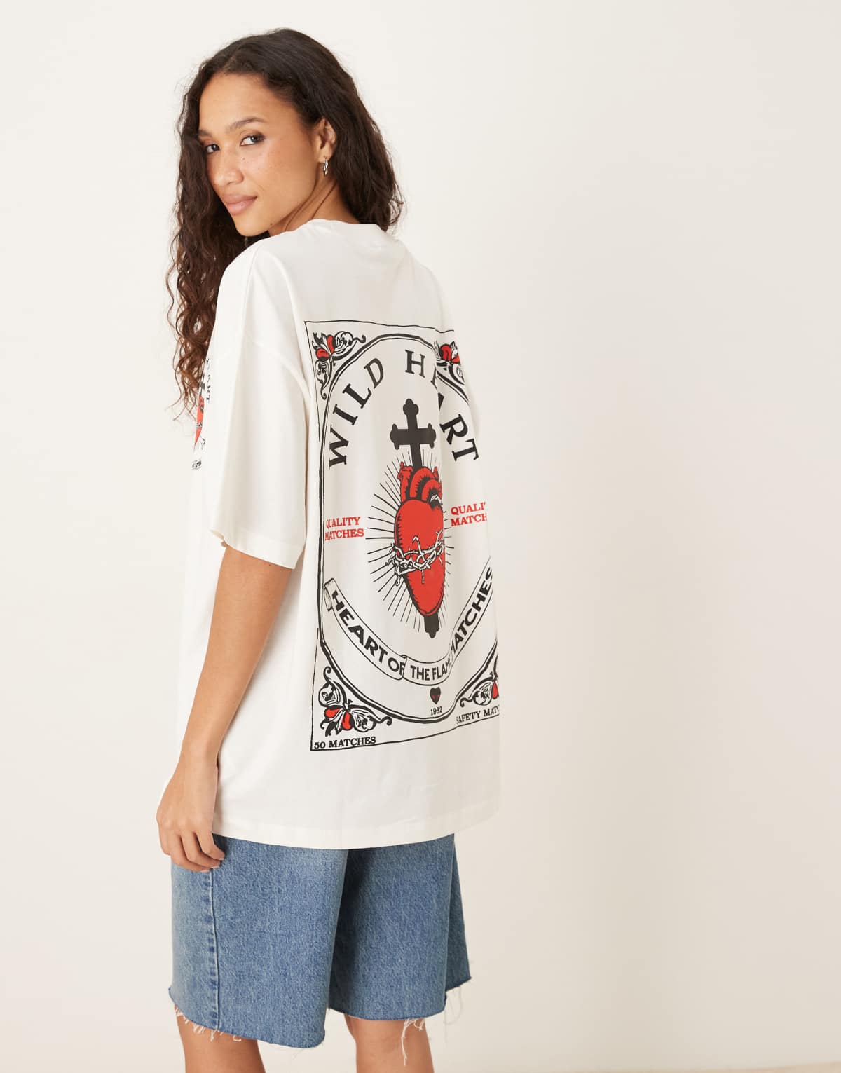 ASOS DESIGN oversized t-shirt with wild heart graphic in cream
