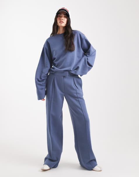 ASOS DESIGN oversized tailored brushback jogger with seam detail in denim blue - view 1
