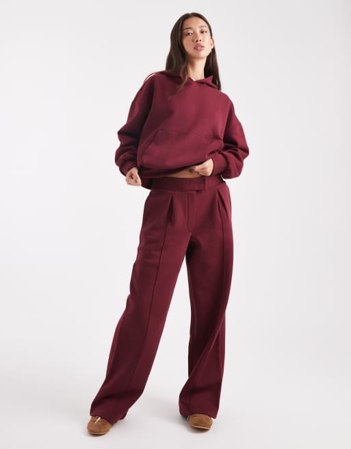 ASOS DESIGN oversized tailored brushback sweatpants with seam detail in burgundy