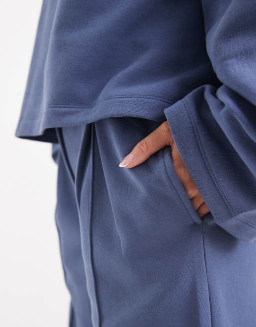 ASOS DESIGN oversized tailored brushback sweatpants with seam detail in denim blue