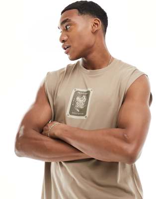 ASOS DESIGN oversized tank in brown with floral chest print