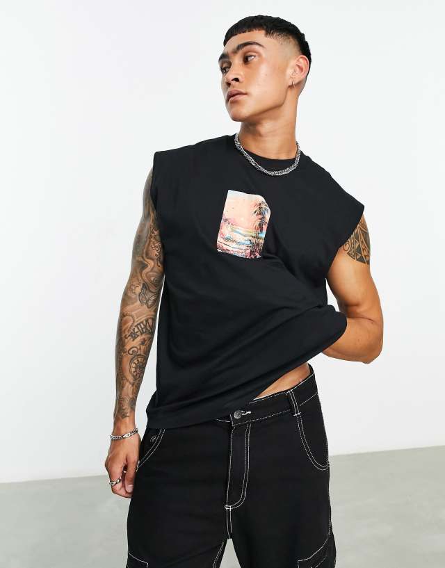 ASOS DESIGN oversized tank top in black with beach chest print