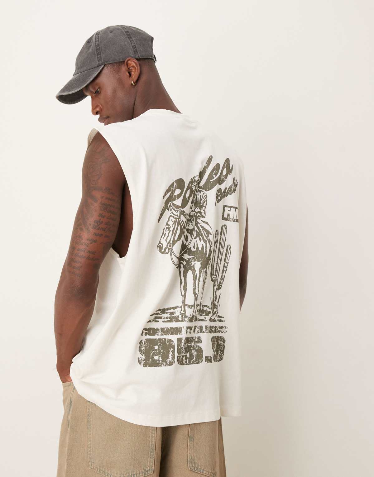 ASOS DESIGN oversized tank with cowboy graphic in cream