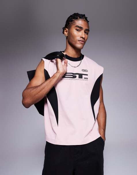 ASOS DESIGN oversized tank with cut and sew detail and sports graphic in pink - view 1