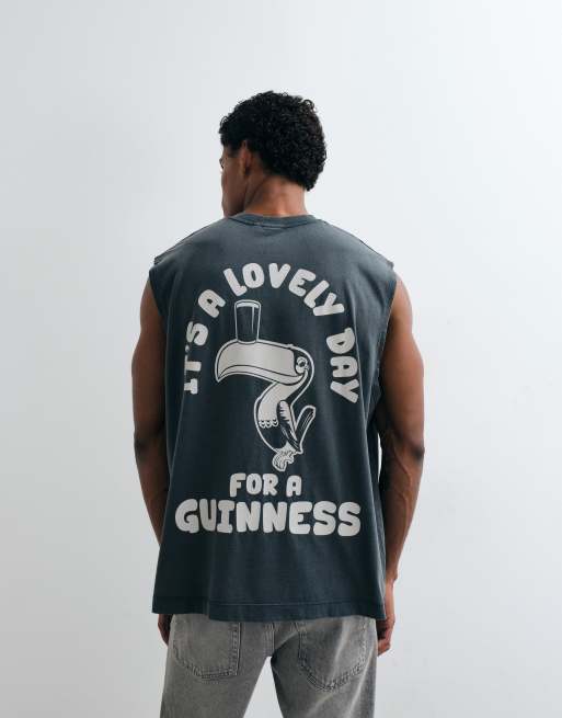 ASOS DESIGN oversized tank with Guinness print in Washed Black, 2 of 5