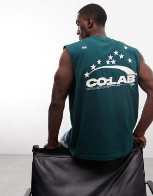 Asos Design Oversized Tank With Street Text Graphic In Green