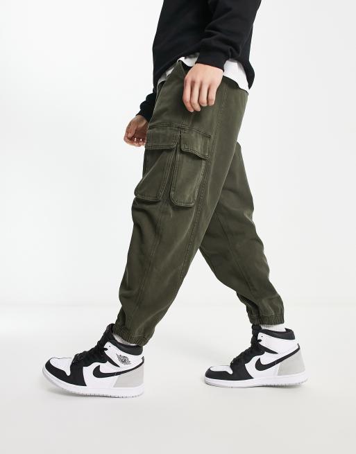 ASOS DESIGN oversized tapered cargo pants in washed khaki