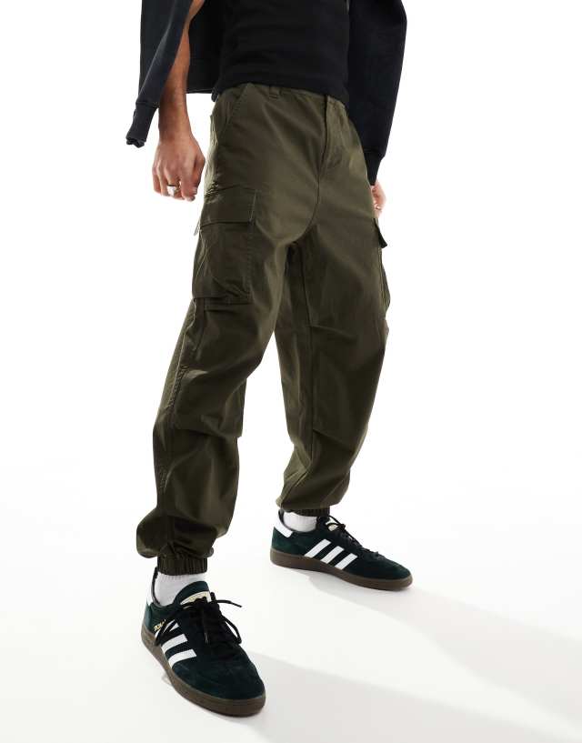 ASOS DESIGN - oversized tapered cargo trousers in khaki