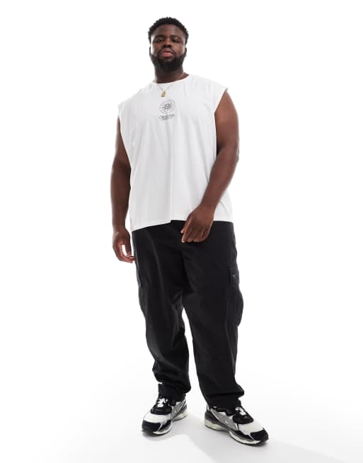 ASOS DESIGN oversized tapered cargo pants with patch in black