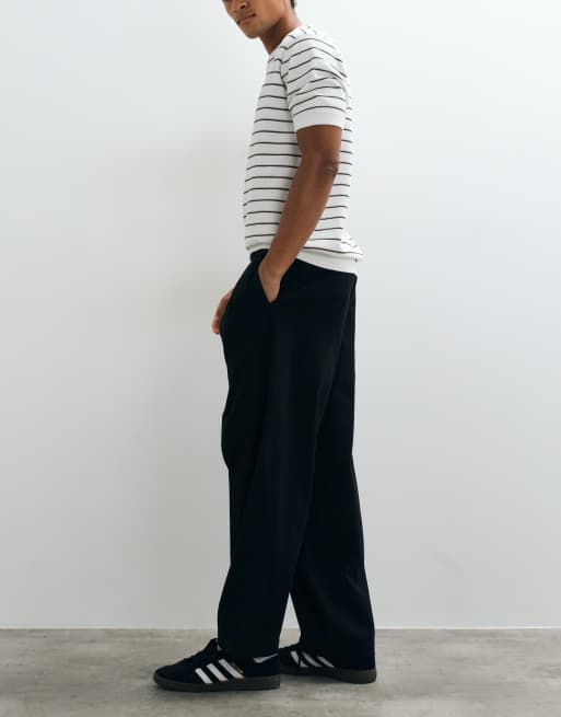 ASOS DESIGN oversized tapered chino in black with inverted pleats, 4 of 10