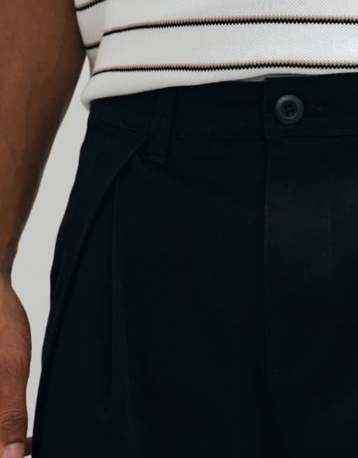 ASOS DESIGN oversized tapered chino in black with inverted pleats, 5 of 10
