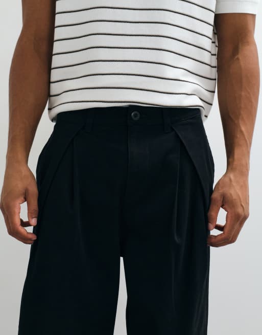 ASOS DESIGN oversized tapered chinos in black with inverted pleats, 3 of 10
