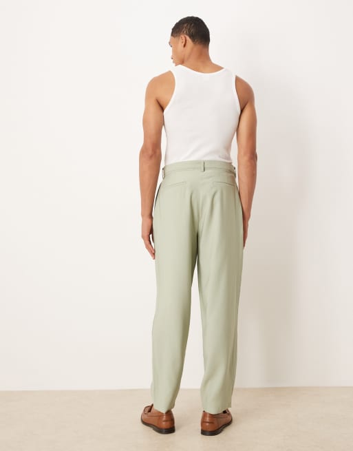 ASOS DESIGN oversized tapered dress pants with belt detail in green