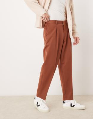 Asos Design Oversized Tapered Dress Pants With Front Pleat In Rust In Red