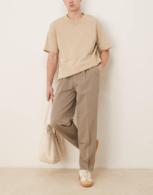 Pantalones de vestir color piedra oscuro de corte tapered extragrande con pinzas delanteras de ASOS DESIGN