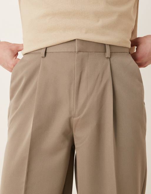 Pantalones de vestir color piedra oscuro de corte tapered extragrande con pinzas delanteras de ASOS DESIGN