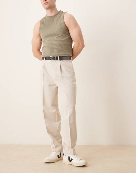 ASOS DESIGN oversized tapered dress pants with front pleats in ecru - view 1