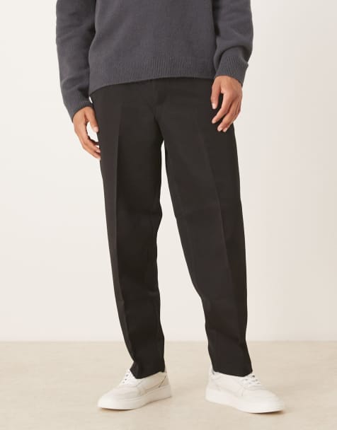 ASOS DESIGN oversized tapered dress pants with half elastic waistband in black - view 1
