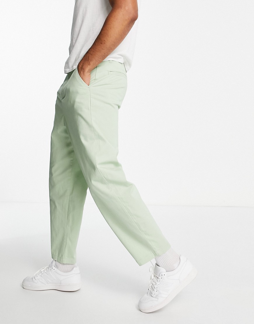 ASOS DESIGN oversized tapered fit chinos in light green