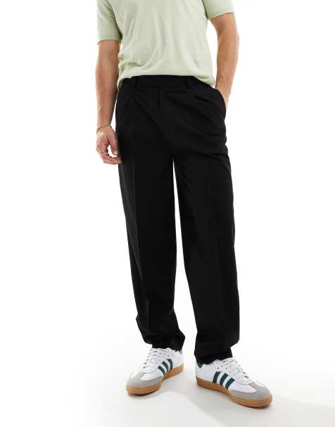 ASOS DESIGN oversized tapered fit dress pants with front pleats in black - view 1