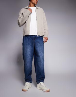 Asos Design Oversized Tapered Fit Jeans With Pleat Detailing In Blue