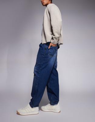 Asos Design Oversized Tapered Fit Jeans With Pleat Detailing In Blue