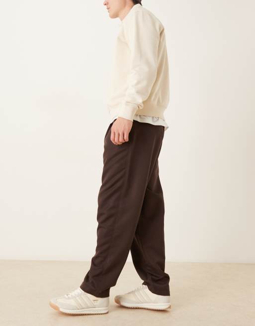 ASOS DESIGN oversized tapered fit pants with pleat detail in brown, 3 of 5