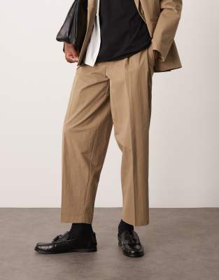 ASOS DESIGN oversized tapered front pleat suit trousers in khaki techy fabric-Green φωτογραφία