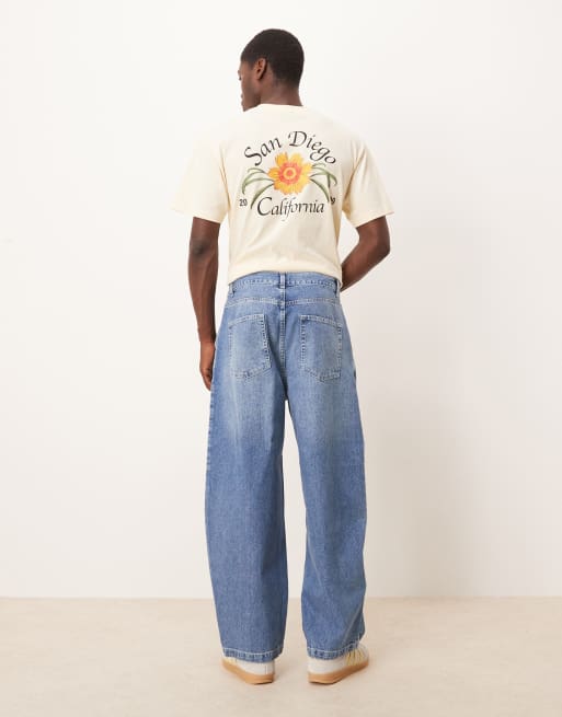 ASOS DESIGN oversized tapered jeans in light wash blue with pleats
