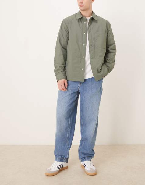 ASOS DESIGN oversized tapered jeans with pleat detail in midwash blue denim - view 1