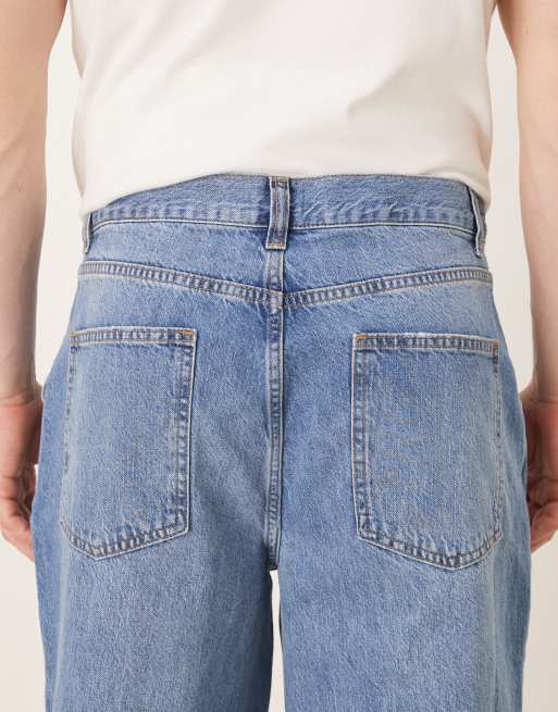 ASOS DESIGN oversized tapered jeans with pleat detail in midwash blue denim, 5 of 5