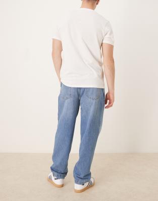 Asos Design Oversized Tapered Jeans With Pleated Detailing In Blue