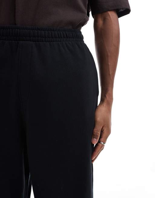 ASOS DESIGN oversized tapered jogger in black, 3 of 5