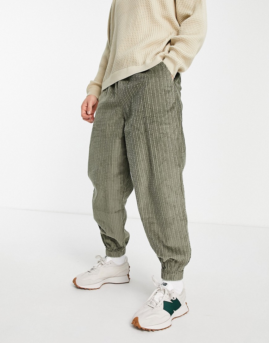 ASOS DESIGN oversized tapered pants in rope effect cord in khaki-Green