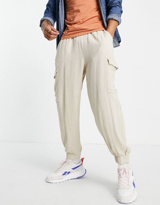 ASOS DESIGN Oversized Cropped Cargo Pants With Rip And Repair Details In  Sand - ShopStyle